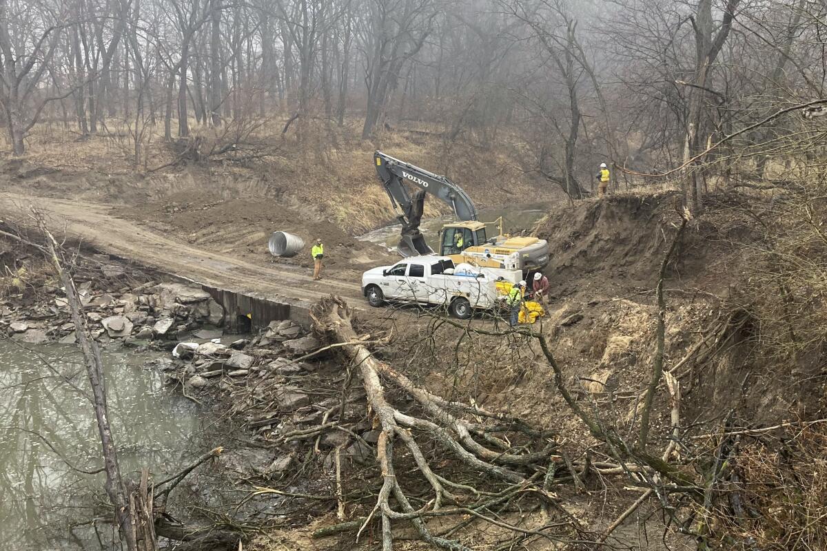 An emergency dam built to contain an oil spill