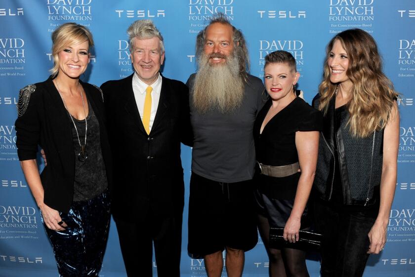 Martie Maguire, director David Lynch, producer Rick Rubin, and Natalie Maines and Emily Robison of the Dixie Chicks arrive at a David Lynch Foundation benefit honoring Rubin at the Beverly Wilshire Hotel on Thursday night.