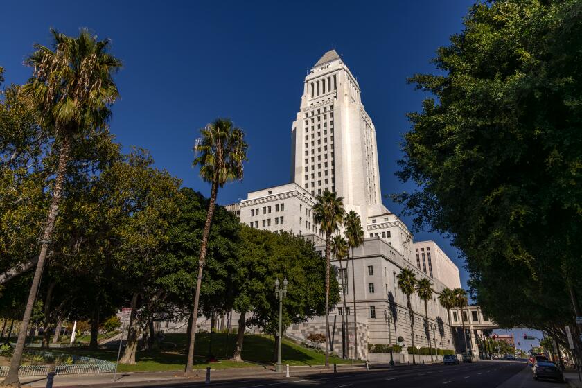 LOS ANGELES, CA - DECEMBER 02: A view of Los Angeles City Hall. Twin Towers Correctional Facility on Saturday, Dec. 2, 2023 in Los Angeles, CA. (Irfan Khan / Los Angeles Times)
