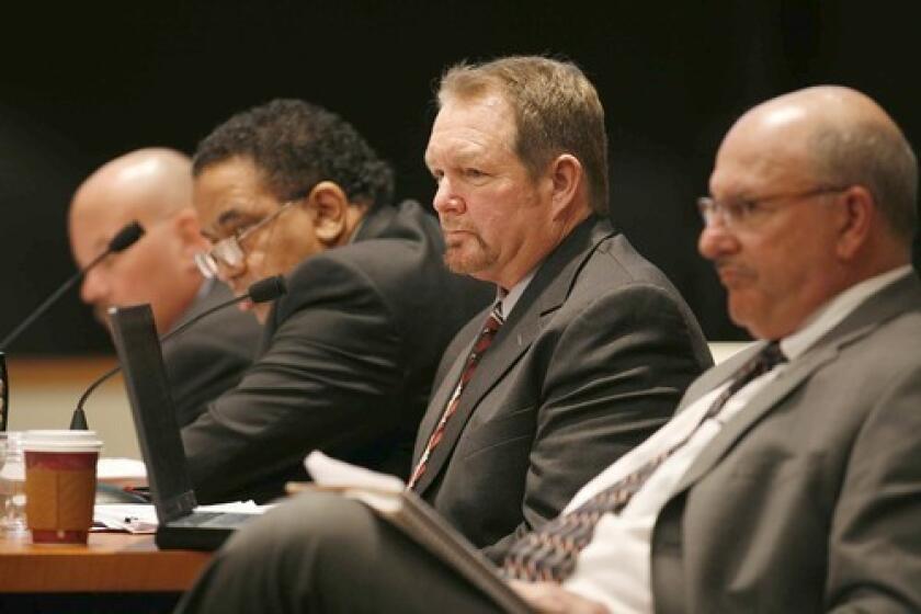 Connex Railroad supervisors Rick Dahl, second from right, and Tom McDonald, center, testify at a federal hearing on the Metrolink crash that killed 25 people, including the train's engineer.