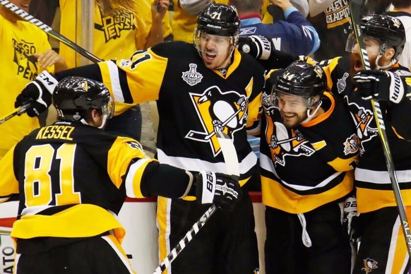 PITTSBURGH, PA - MAY 31: Evgeni Malkin #71 of the Pittsburgh Penguins celebrates with teammates after scoring a goal during the third period in Game Two of the 2017 NHL Stanley Cup Final against the Nashville Predators at PPG Paints Arena on May 31, 2017 in Pittsburgh, Pennsylvania. (Photo by Gregory Shamus/Getty Images) ** OUTS - ELSENT, FPG, CM - OUTS * NM, PH, VA if sourced by CT, LA or MoD **
