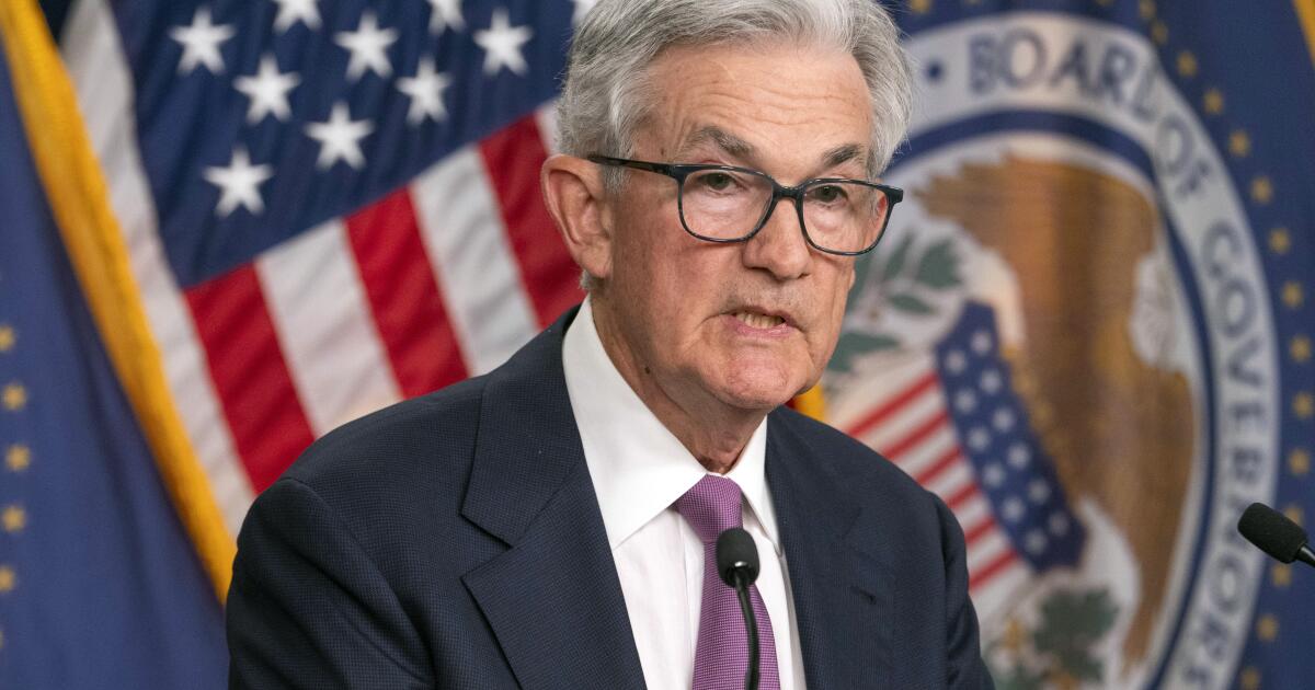 Fed leader, concerned about jobs downturn, tees up interest rate cuts