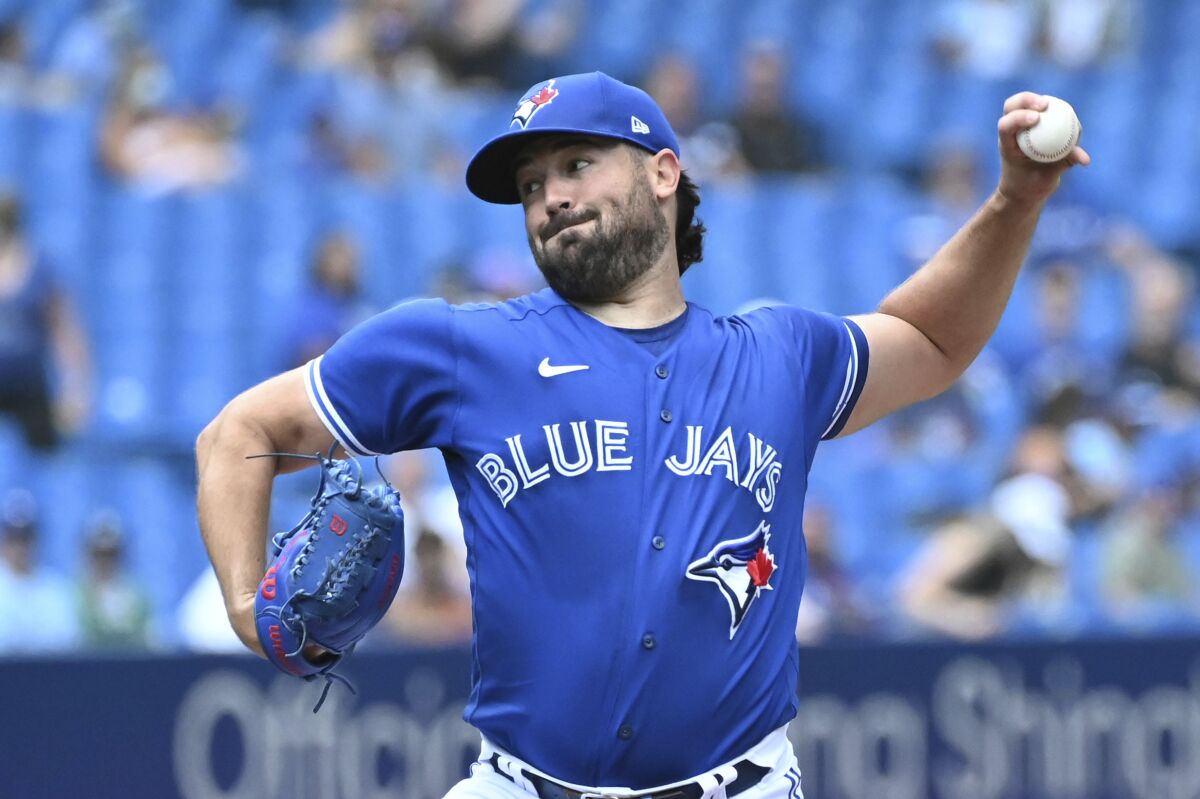Toronto Blue Jays' Robbie Ray pitches against the Oakland Athletics in the first inning of a baseball game in Toronto on Sunday, Sept. 5, 2021. (Jon Blacker/The Canadian Press via AP)