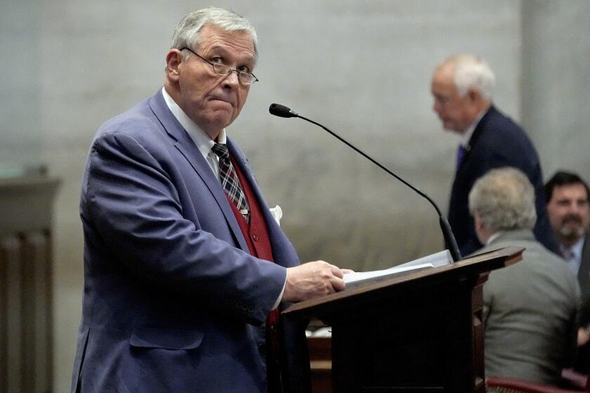 State Rep. John Ragan, R-Oak Ridge, presents a bill to vacate the entire Tennessee State University board of trustees during a House session Thursday, March 28, 2024, in Nashville, Tenn. (AP Photo/George Walker IV)