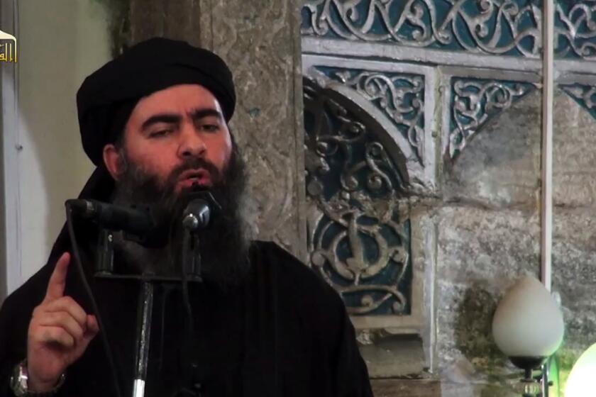 (FILES) This file photo taken on July 05, 2014 shows an image grab from a propaganda video released on the same date by al-Furqan Media, allegedly shows the leader of the Islamic State (IS) jihadist group, Abu Bakr al-Baghdadi, aka Caliph Ibrahim, adressing Muslim worshippers at a mosque in the militant-held northern Iraqi city of Mosul. - The leader of the Islamic State jihadist group Abu Bakr al-Baghdadi called on Muslims to wage "jihad" in a purported new audio recording released On August 22, 2018. The Telegram message on the occasion of Eid al-Adha is the first known to be released since another was broadcast in September last year, and comes as IS has lost most of its territory in Iraq and Syria. (Photo by - / AL-FURQAN MEDIA / AFP)-/AFP/Getty Images ** OUTS - ELSENT, FPG, CM - OUTS * NM, PH, VA if sourced by CT, LA or MoD **