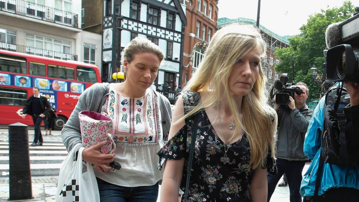 Connie Yates, right, mother of terminally ill 11-month-old Charlie Gard, arrives at the Royal Courts of Justice in London on July 26, 2017.