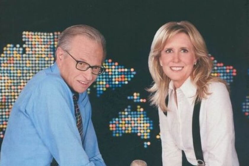 San Diegan Wendy Walker, right, produced the show of talk host Larry King, left, from 1993 through 2010. He died Jan. 23.