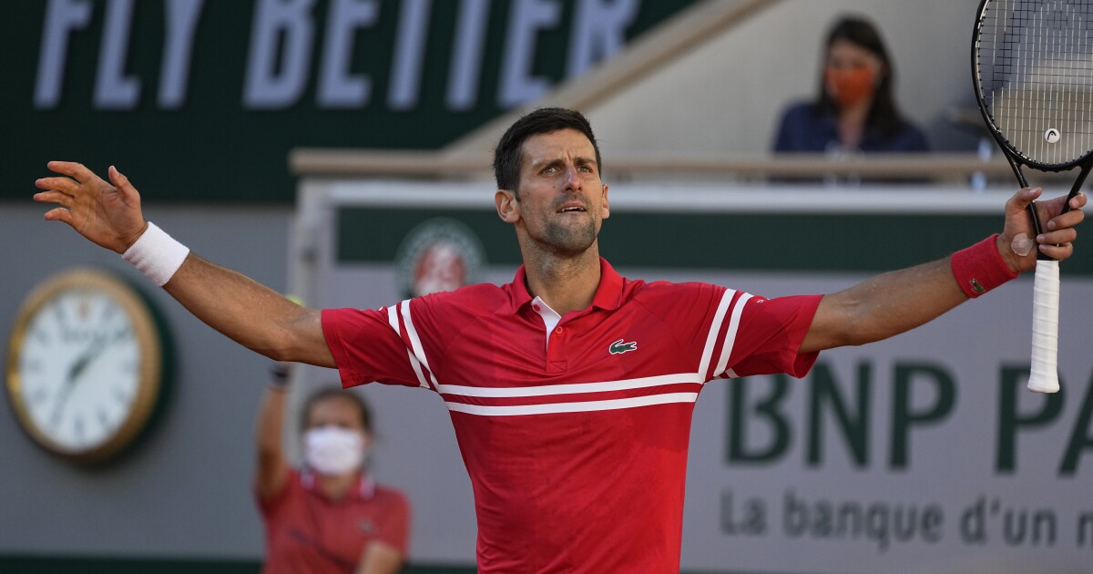 Novak Djokovic tops Stefanos Tsitsipas in five at French Open for 19th major