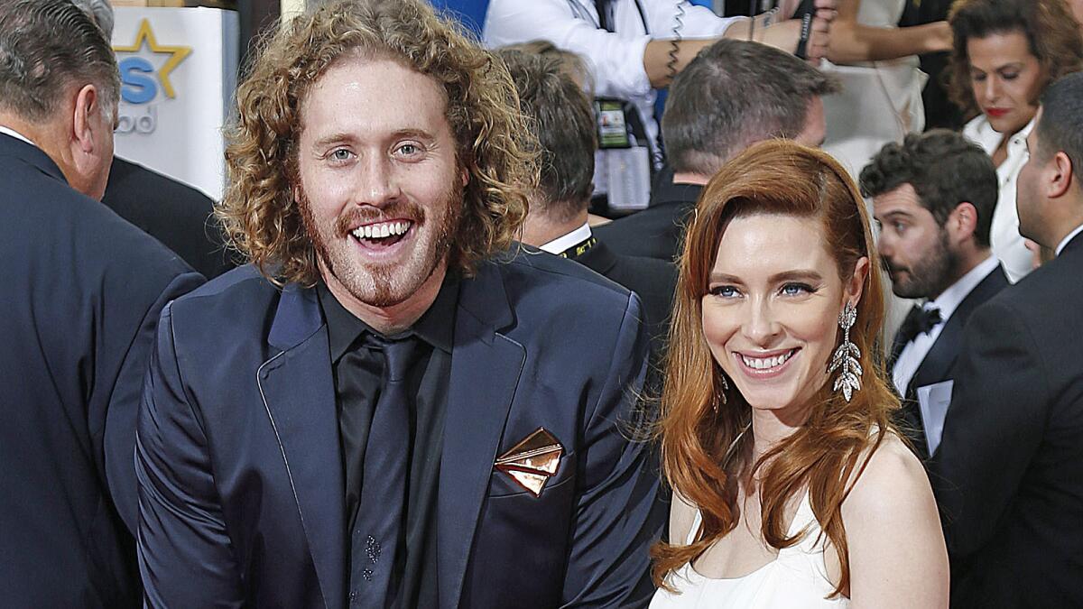 BEVERLY HILLS, CA - January 12, 2015 Actors T.J. Miller (L) and Kate Gorney at the 72nd Annual Golden Globe Awards show at the Beverly Hilton Hotel on January 11, 2015. (Wally Skalij / Los Angeles Times)