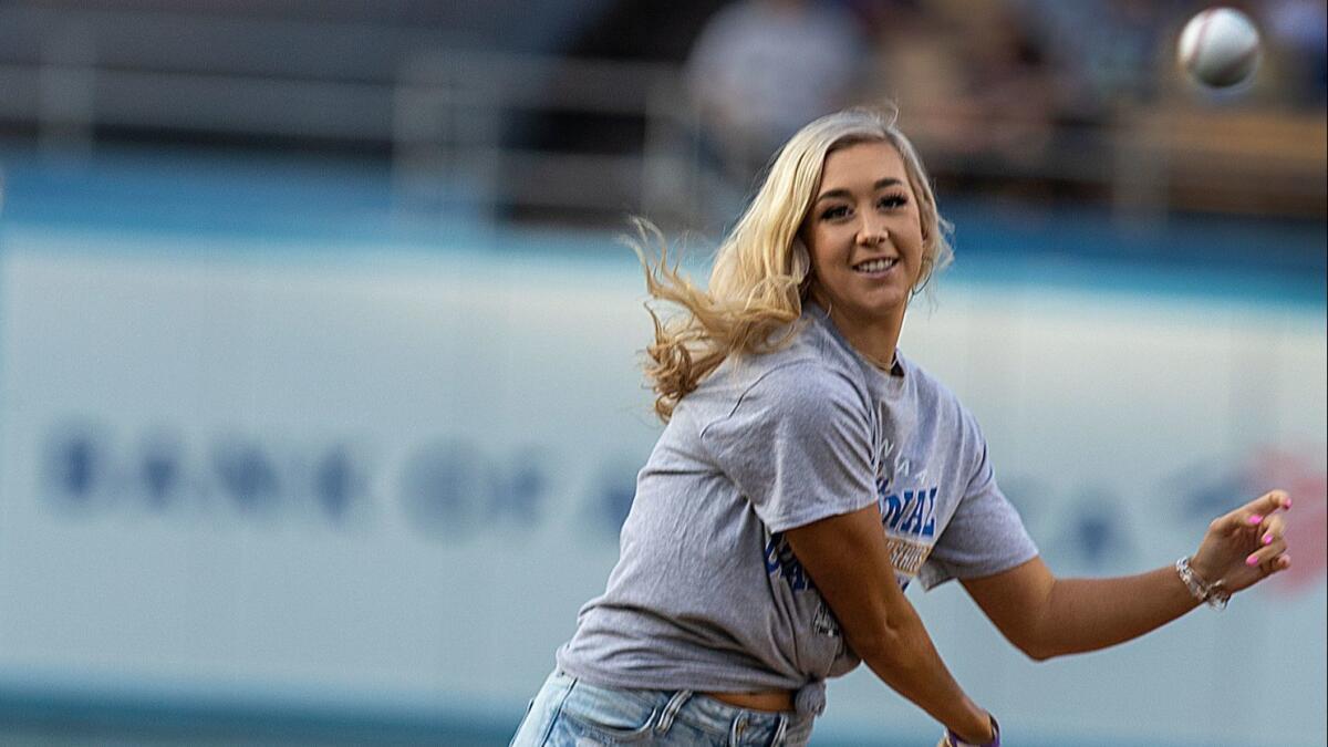 UCLA softball player Stevie Wisz throws out the ceremonial first pitch at Dodger Stadium in on June 17.