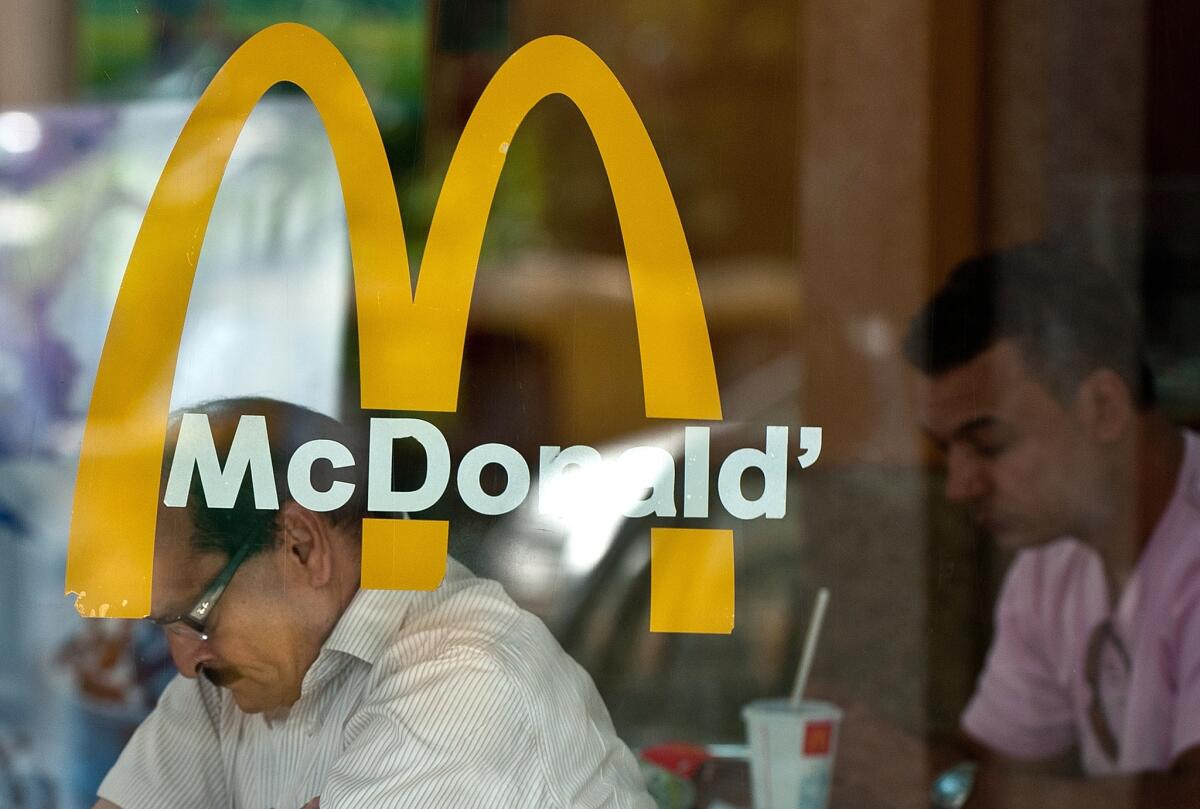 "Too many hard-working families are being forced to depend on poverty-level wages," 53 members of Congress wrote in a letter mailed Wednesday to restaurant executives including McDonald's Chief Executive Don Thompson.