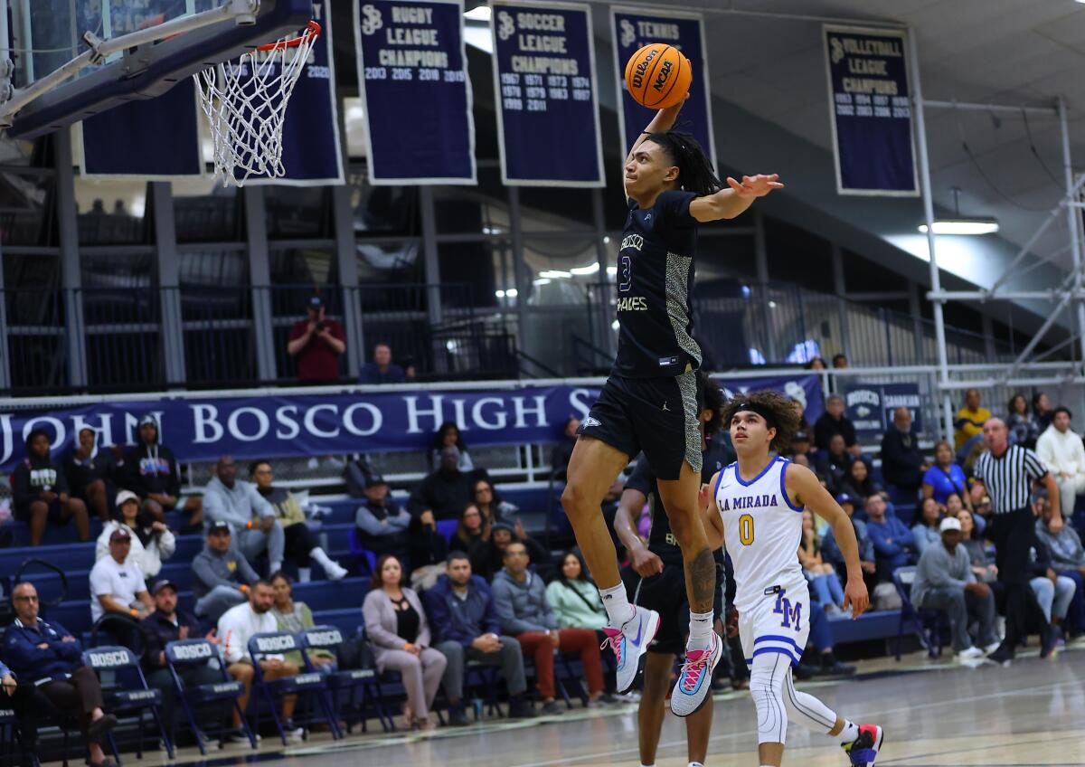 Elzie Harrington of St. John Bosco elevates for a tomahawk dunk during a game against La Mirada.