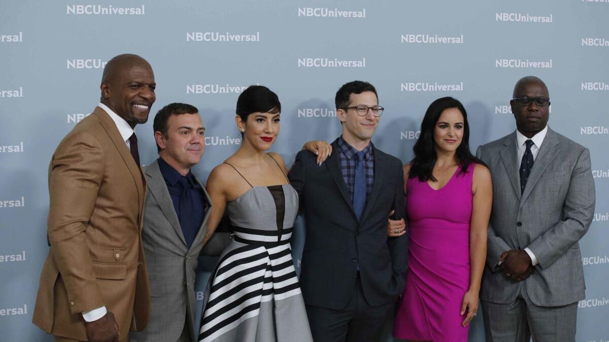 Andy Samberg, center, in tie, and the "Brooklyn Nine-Nine" cast at the NBCUniversal upfront campaign at Radio City Music Hall in New York City.