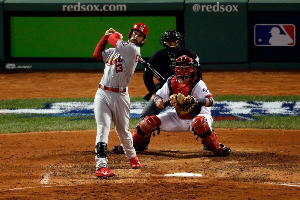 St. Louis second baseman Matt Carpenter drives in two runs on a bases-loaded sacrifice fly in the seventh inning of the Cardinals' 4-2 win over the Boston Red Sox in Game 2 of the World Series on Thursday.