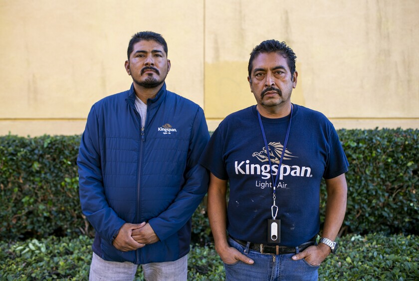 Micaias Pacheco, left, and Israel Maldonado took part in an indoor air pollution study.