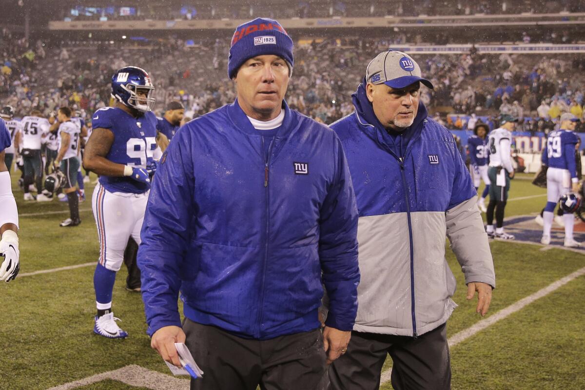 Giants coach Pat Shurmur leaves the field after a loss to the Eagles on Dec. 29 at MetLife Stadium.