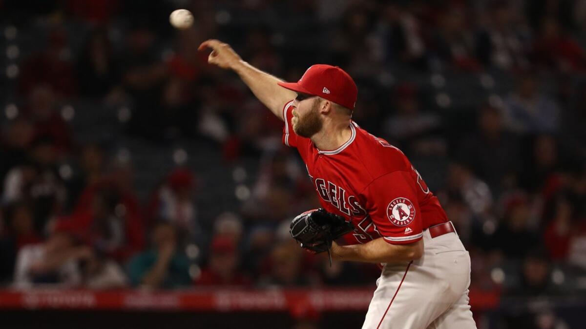 Angels closer Cody Allen delivers during the ninth inning of the Angels' 5-3 loss to the Seattle Mariners on April 19.
