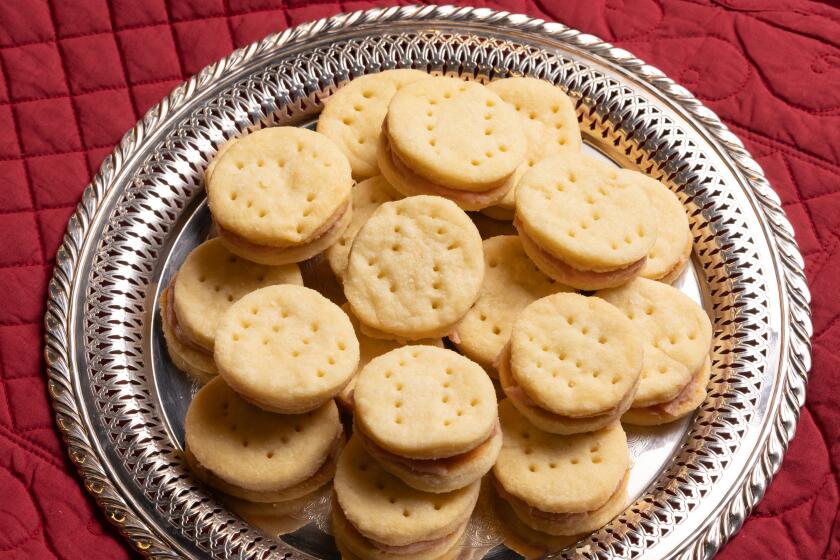 LOS ANGELES, CA -- THURSDAY, NOVEMBER 20, 2025: Bestamor's Cream Wafers (Pariserwafier) With Raspberry Buttercream by Janice and Jim Knight. (Catherine Dzilenski / For The Times)
