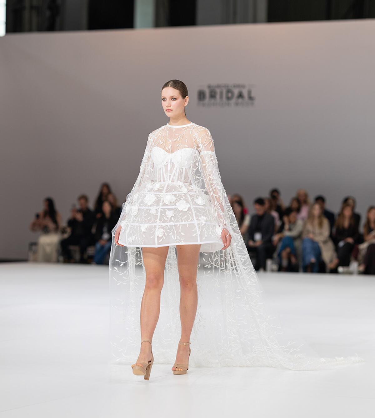 A model walks the runway at the Isabell Kristensen show for Bridal Fashion Week.