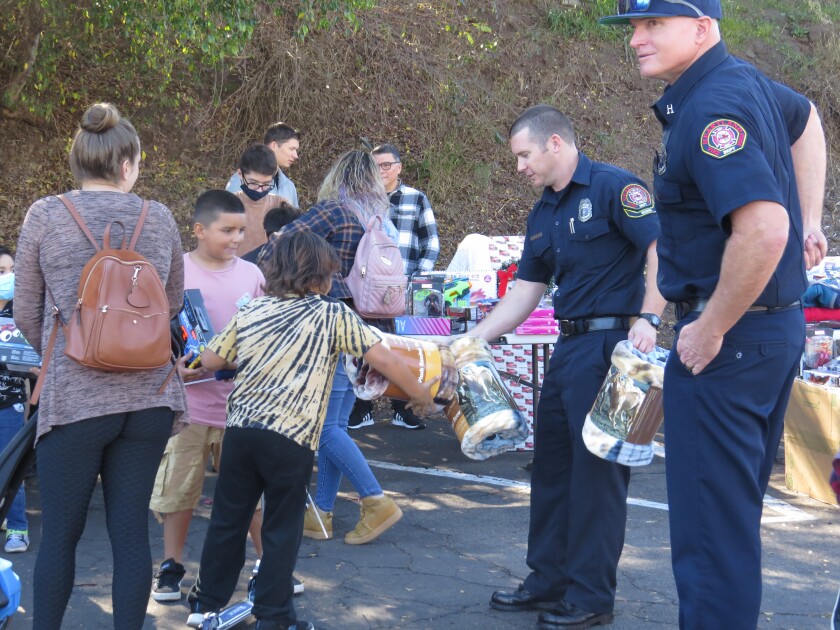Kids Fashion Week Network So-Cal, the Lemon Grove Lions Club and Improving Lemon Grove gave away toys for the holidays. 