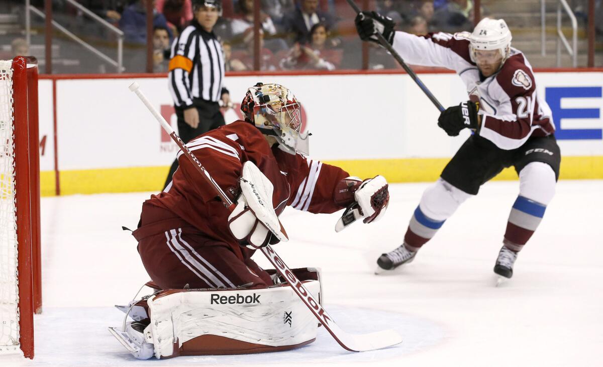Arizona Coyotes goalie Mike Smith makes a save during a game on Nov. 25.
