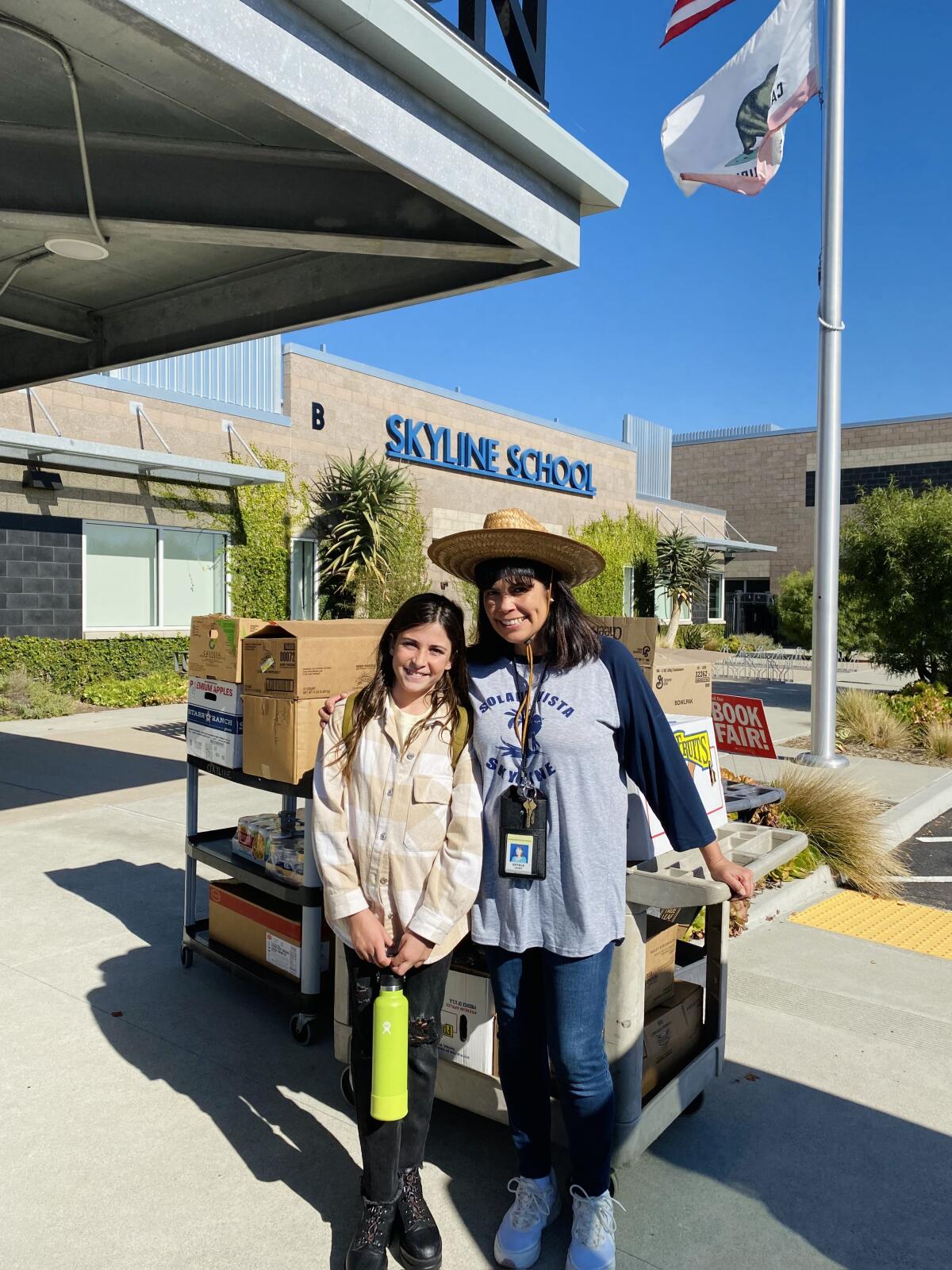 Skyline School sixth grader Olivia Issacs and teacher Estela Leidy.