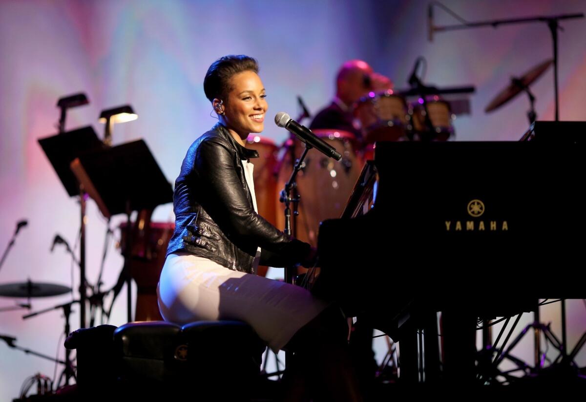 Singer Alicia Keys performs onstage at 2014 MusiCares Person Of The Year Honoring Carole King at Los Angeles Convention Center on Jan. 24, 2014.