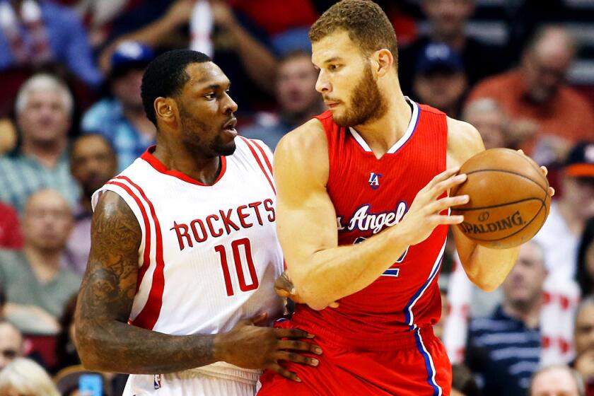 Tarik Black, guarding Clippers forward Blake Griffin during a game last month, is a rookie out of Kansas who played in 25 games for the Rockets.