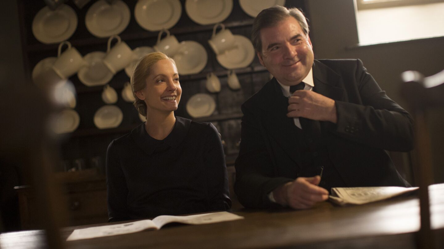Joanne Froggatt and Brenday Coyle relax between takes in the downstairs servants' quarters set at Ealing Studios in West London.