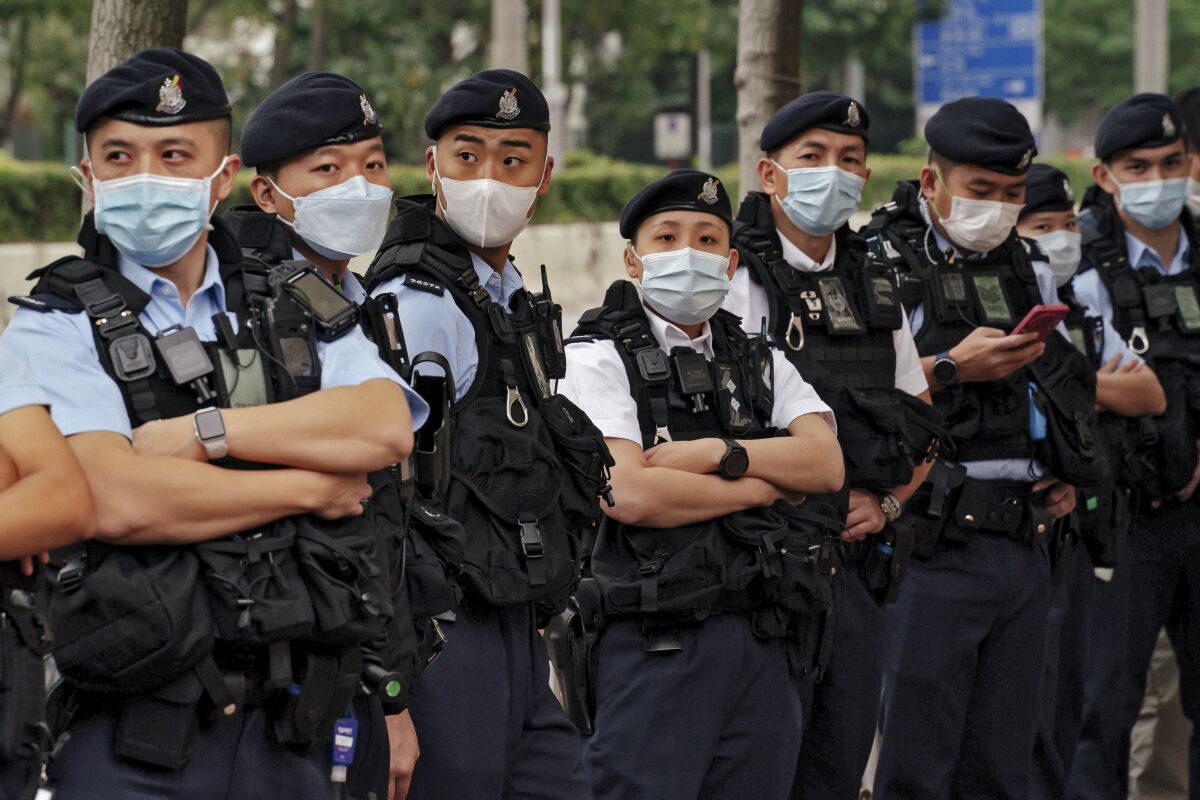 Police officers outside a Hong Kong courthouse