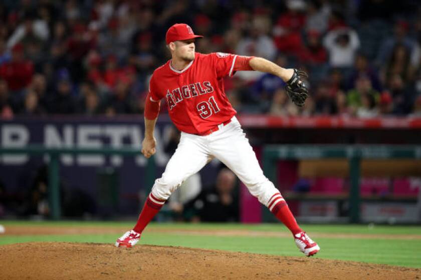ANAHEIM, CA - May 25: Ty Buttrey #31 of the Los Angeles Angels pitches during the game against the Texas Rangers at Angel Stadium on May 25, 2019 in Anaheim, California. The Angels defeated the Rangers 3-2. (Photo by Rob Leiter/MLB Photos via Getty Images)