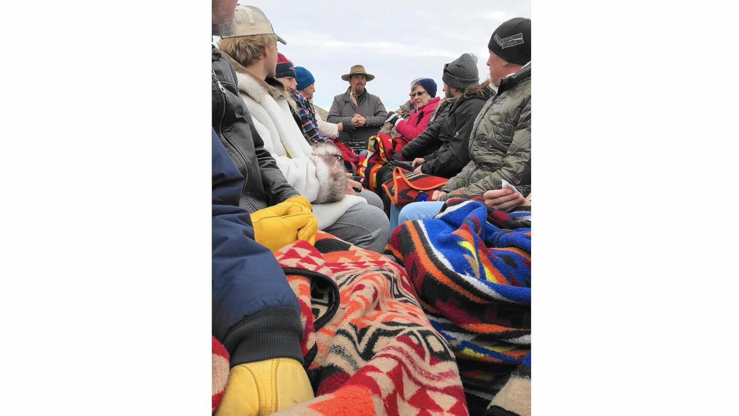 Visitors to the National Elk Refuge in Jackson bundle up for a wildlife-watching sleigh ride.