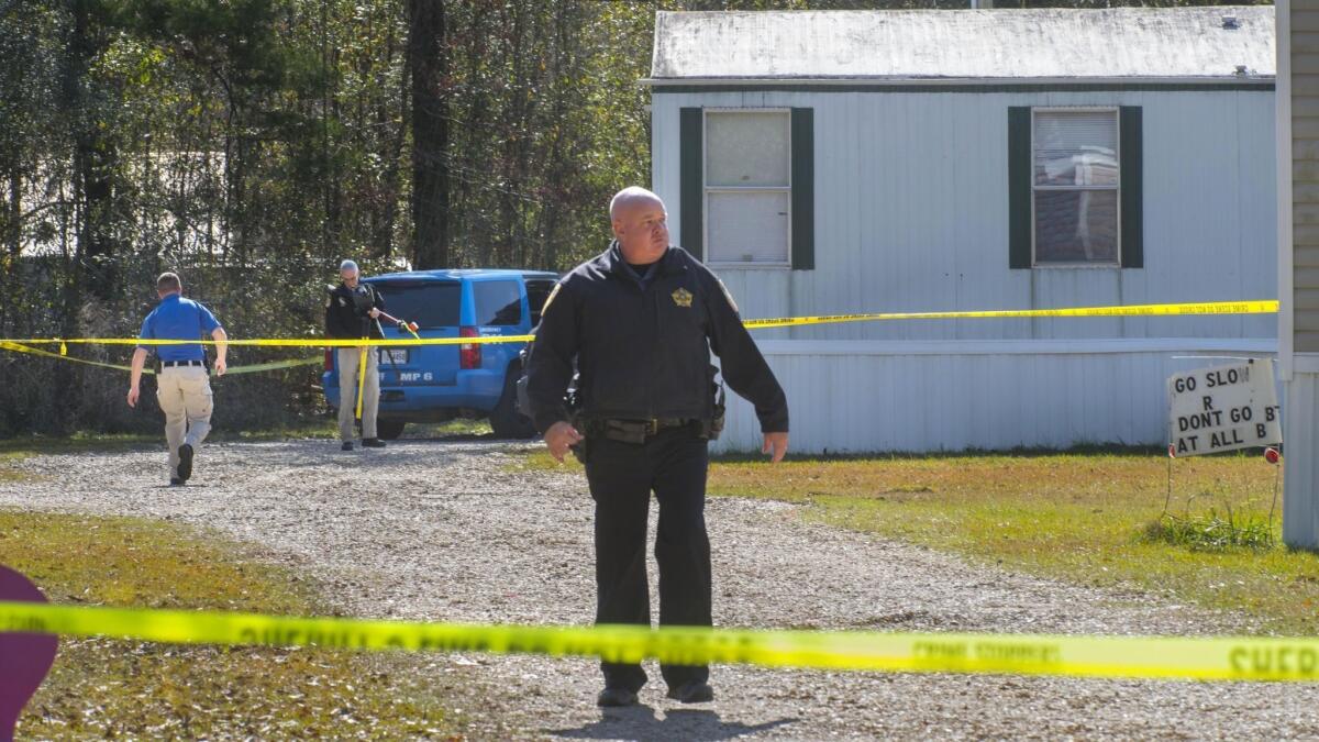 Investigators work the scene of a shooting in Livingston Parish in Louisiana.
