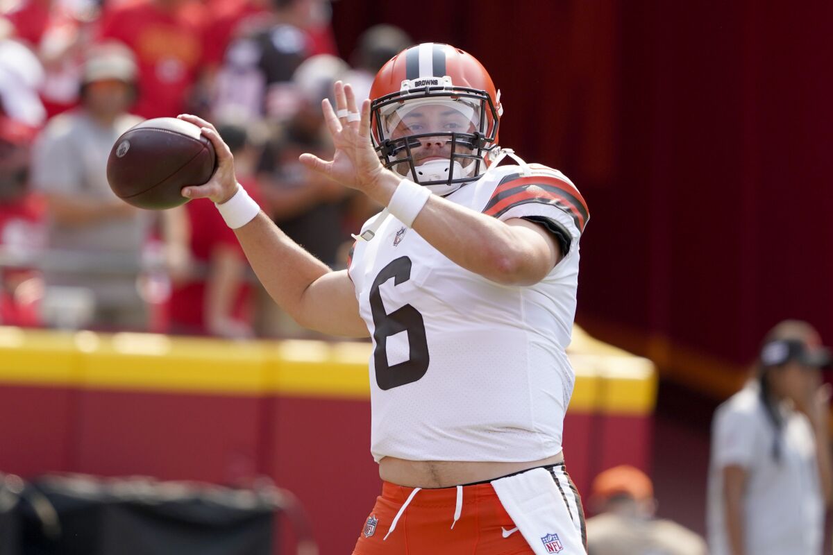 Cleveland Browns quarterback Baker Mayfield warms up before the start of an NFL football game against the Kansas City Chiefs Sunday, Sept. 12, 2021, in Kansas City, Mo. (AP Photo/Ed Zurga)
