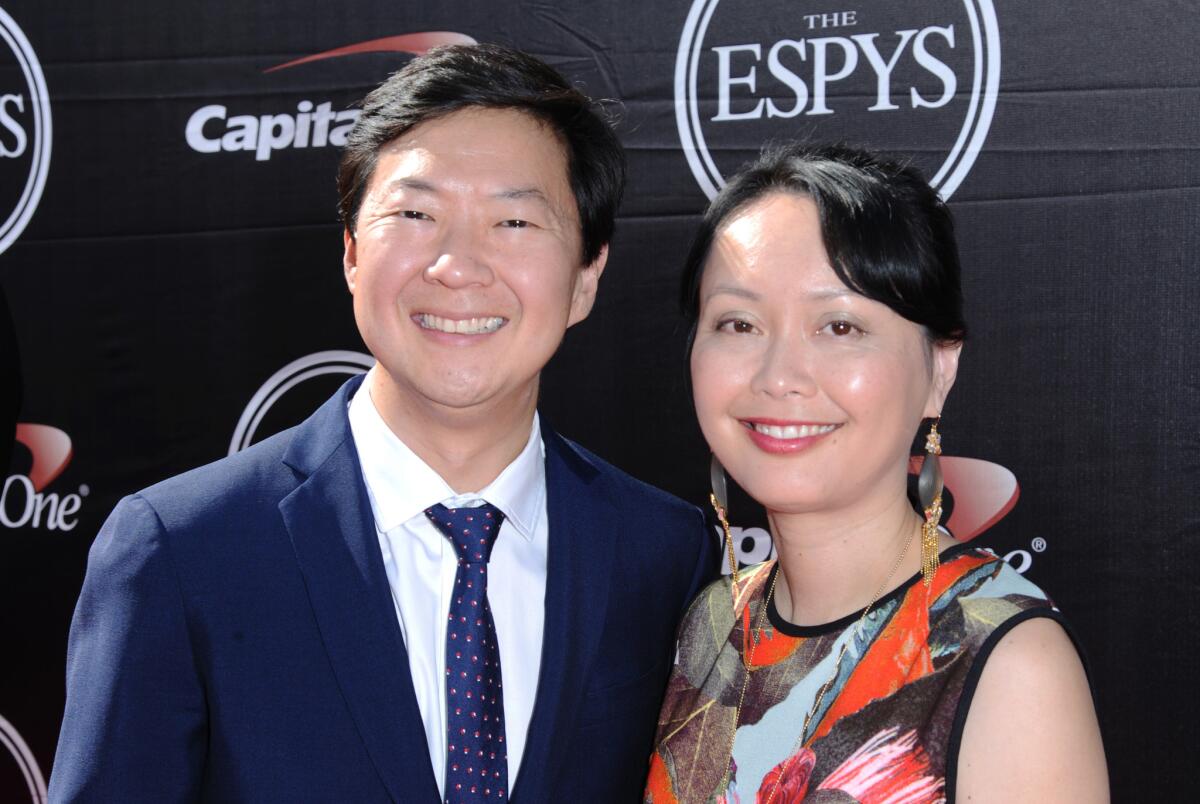 Ken Jeong, left, and his wife, Dr. Tran Ho, at the ESPY Awards in L.A. last month. Jeong, a former physician, will star in "Dr. Ken."