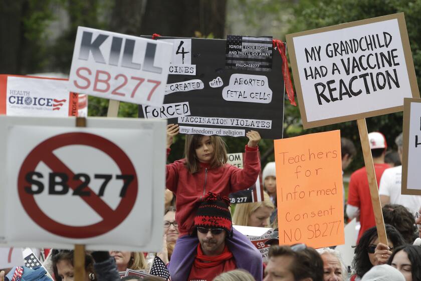 Outside the Capitol in Sacramento last week, protesters rally against a measure that would toughen vaccination requirements for children in California public schools.