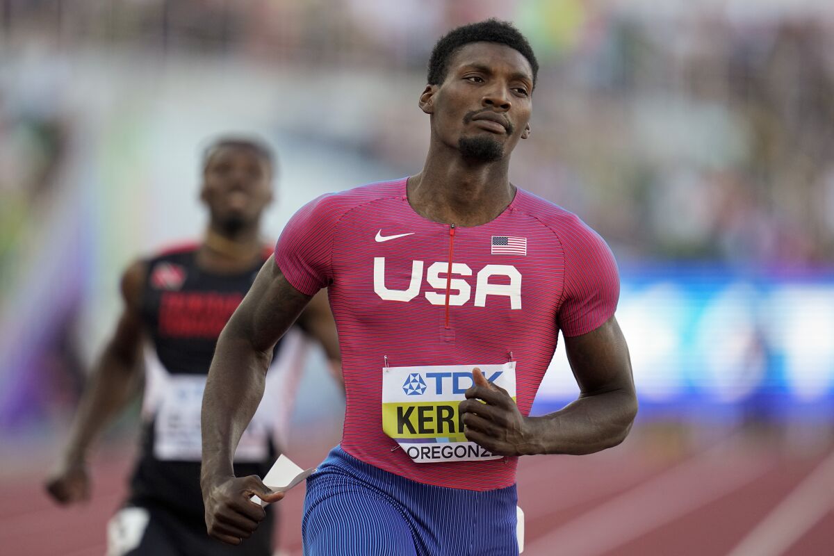 American sprinter Fred Kerley wins a heat in the men's 100 meters in 9.79 seconds at the World Athletics Championships.