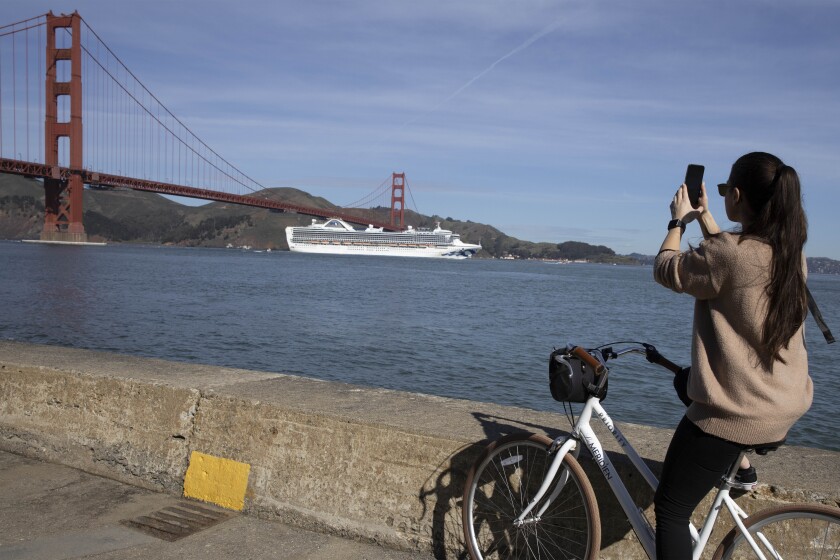 The Grand Princess cruise ship sails into San Francisco Bay to dock at the Port of Oakland.