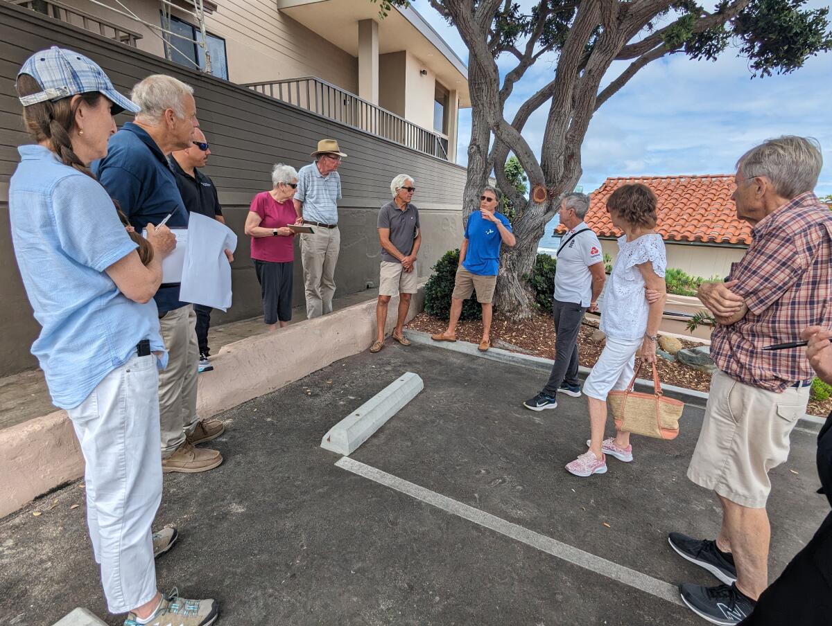 A volunteer working group meets Aug. 10 to discuss how to proceed with a plan to renovate a nearby beach accessway.