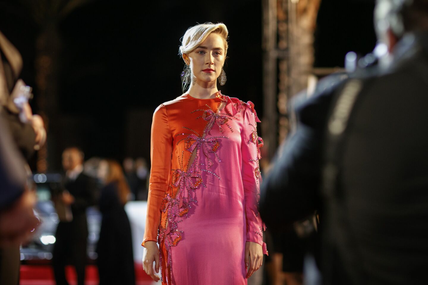 Saoirse Ronan walks the red carpet of the 18th annual Palm Springs International Film Festival Gala. Ronan received the Desert Palm Achievement Award for her work on "Lady Bird."
