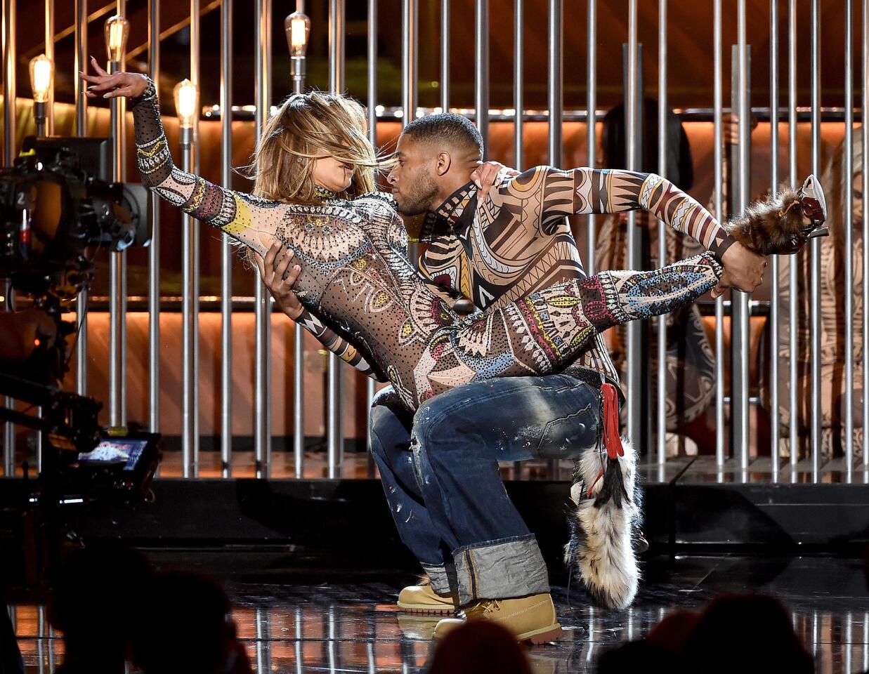 Host Jennifer Lopez performs onstage during the opening.