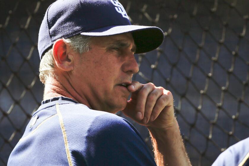 Former San Diego Padres manager Bud Black leans on a batting cage while watching batting practice before a game on April 27, 2015.