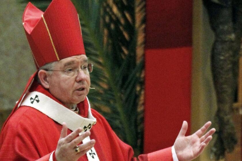 Los Angeles Archbishop Jose Gomez, seen here last April, relieved his predecessor, Cardinal Roger M. Mahony, of his remaining public duties in the church.