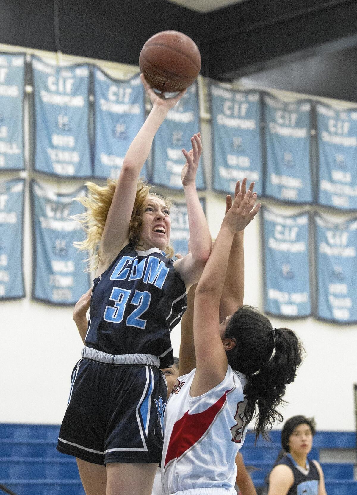 Corona del Mar High's Natalia Bruening (32) scored 12 points against Segerstrom in the CdM Tip-Off Tournament semifinals on Friday.