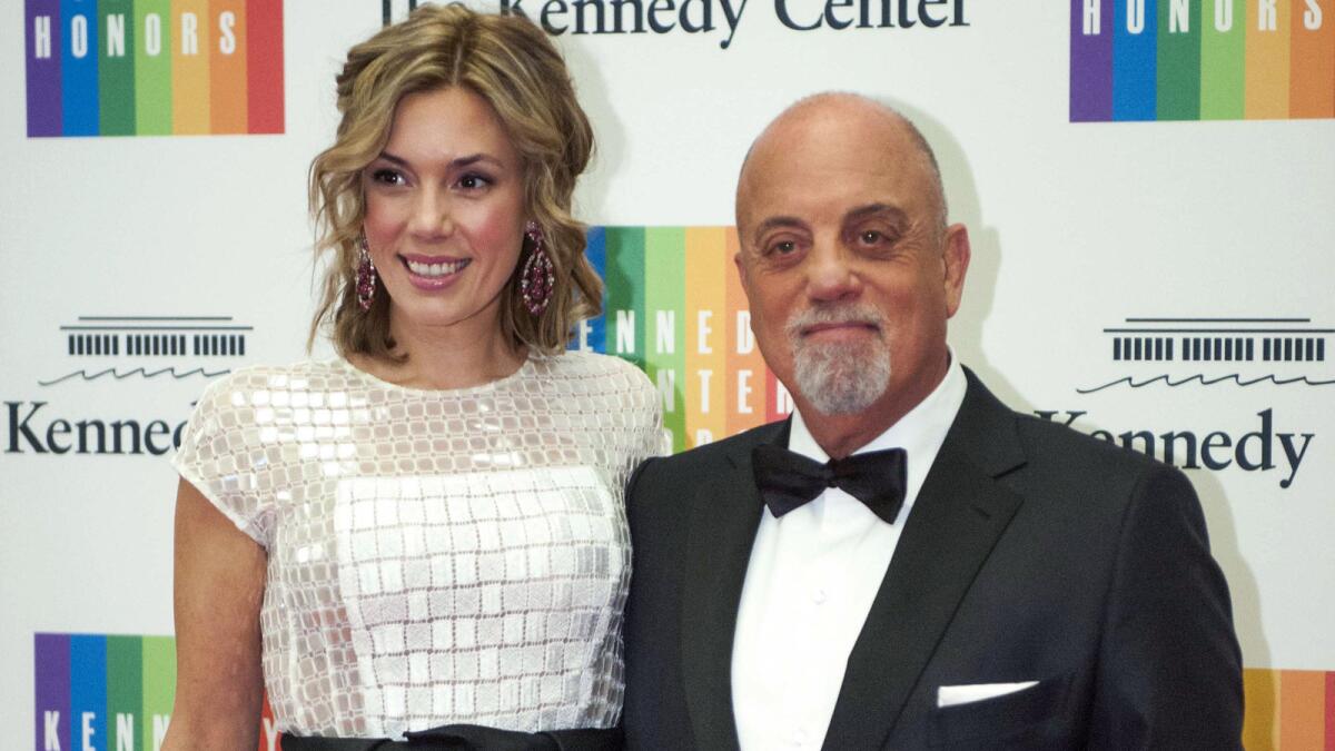Kennedy Center Honoree Billy Joel and Alexis Roderick arrive at the Kennedy Center Honors gala dinner in Washington in 2013.