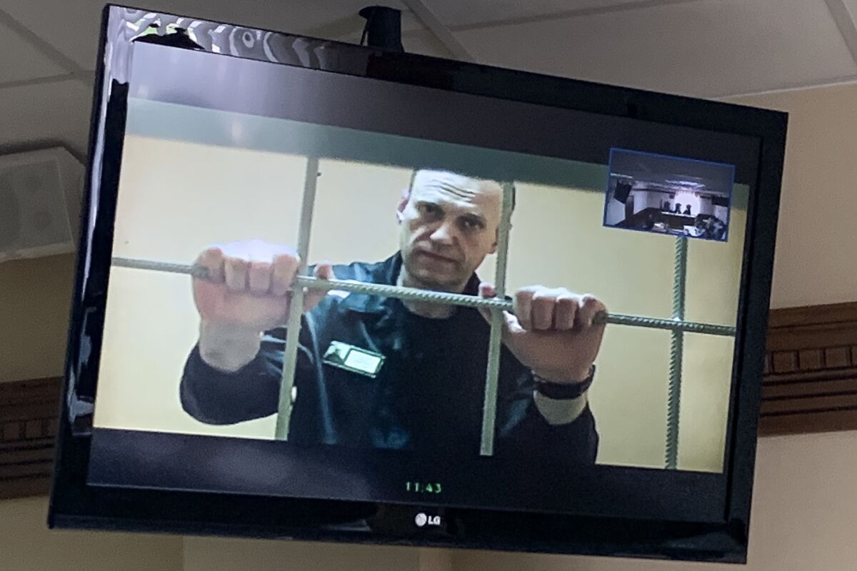 Russian opposition leader Alexei Navalny appears from prison on a video link provided by the Russian Federal Penitentiary Service, at a courtroom in Vladimir, Russia, Tuesday, June 7, 2022. A court in Vladimir region on Tuesday rejected an appeal of Russian opposition leader Alexei Navalny against the correctional colony's decision to label him "a person inclined to commit crimes of a terrorist or extremist nature." (AP Photo/Vladimir Kondrashov)
