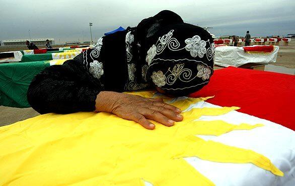 Kurdish woman weeps