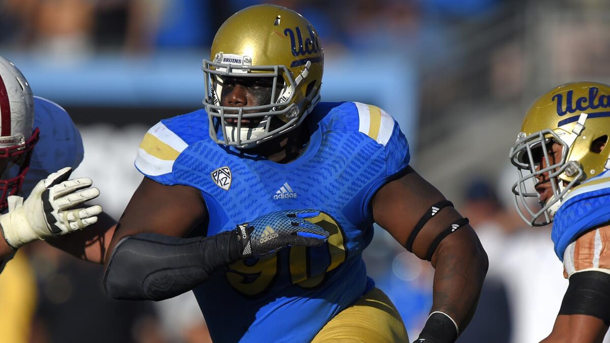 UCLA defensive lineman Ellis McCarthy runs during the Bruins' loss to Stanford on Nov. 28.