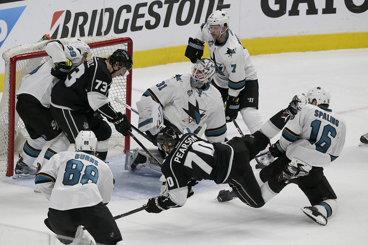 Kings forward Tanner Pearson dives as he shoots the puck at Sharks goalie Martin Jones during a third period power play in Game 2 of their first-round playoff series on April 16.