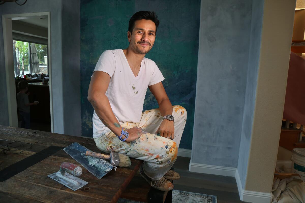 Artist Dionisio Ceballos has changed his career focus, now creating murals and wall finishes for homes.
